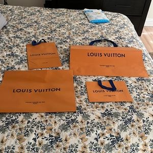 Louis Vuitton shopping bags